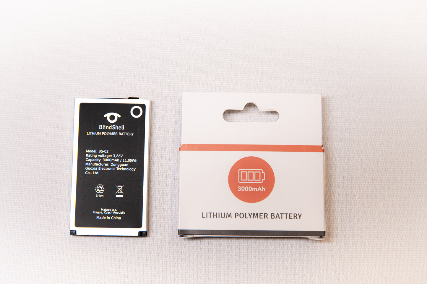 Lithium polymer battery and its packaging on a white background