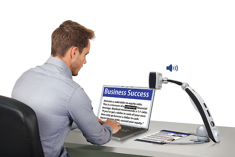 User using the Transformer HD to read a document.