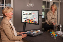 Load image into Gallery viewer, A woman reading a recipe on the Clearview C HD Flat Panel