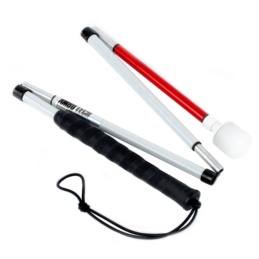 A folded graphite cane with a red tip and a black wrist strap.