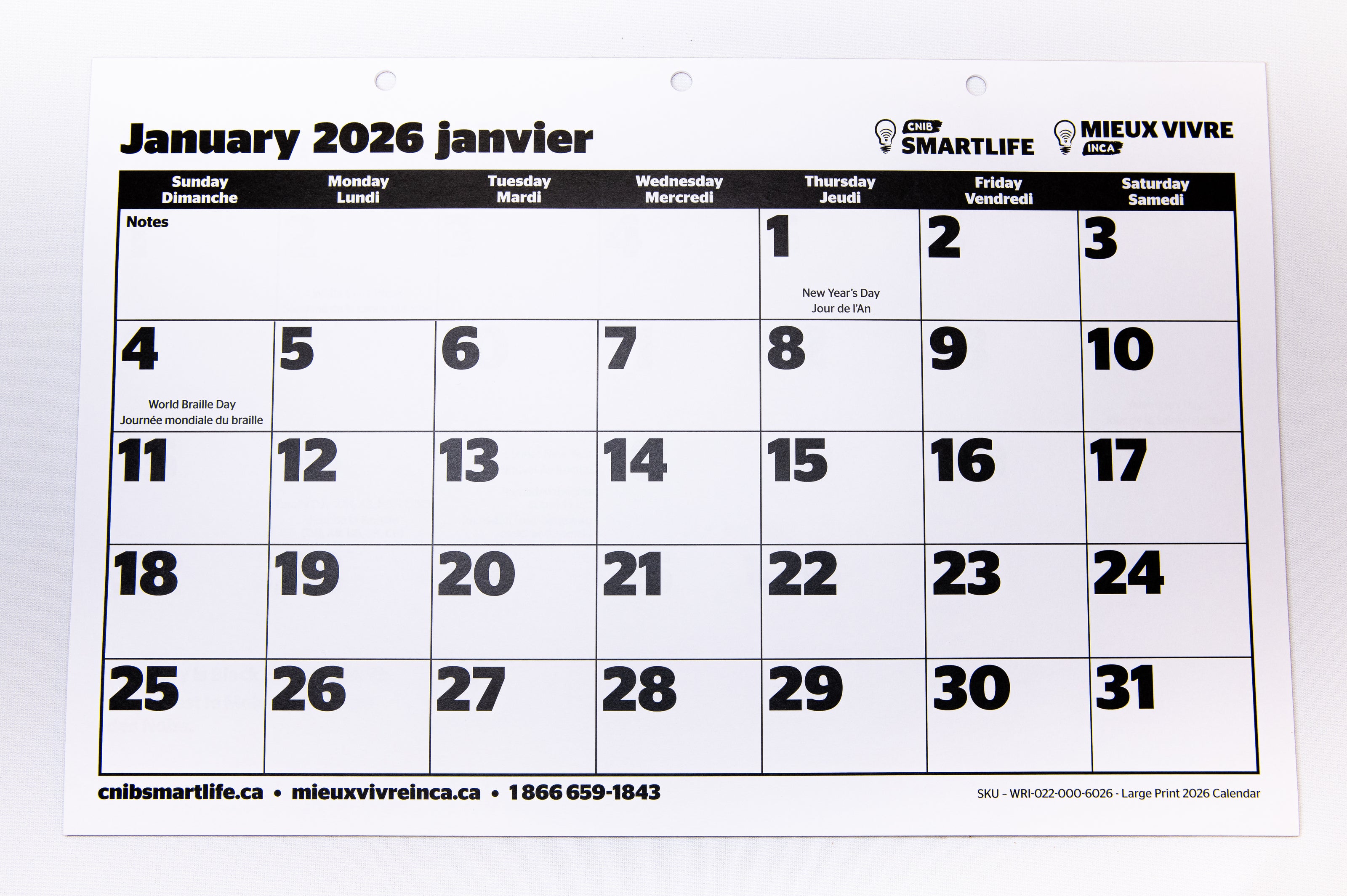 A large print 2026 calendar with CNIB/ INCA branding on a white background
