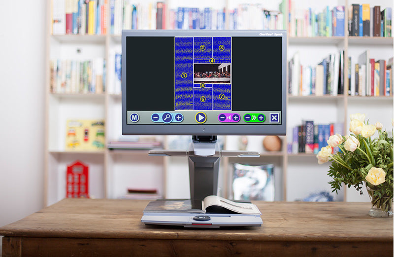 Clearview+ Speech on a desk with text showing on the screen.