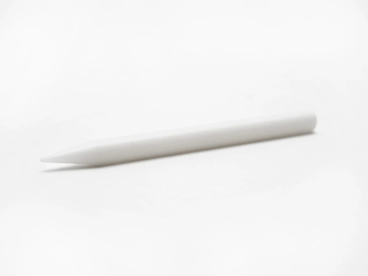 A white, slim cylindrical eraser s with a pointed tip, shown diagonally on a plain white background.