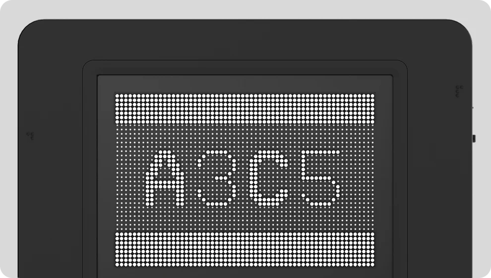 Dot Pad X displaying raised tactile text on the graphics display surface for reading through touch. Displayed is A3C5.