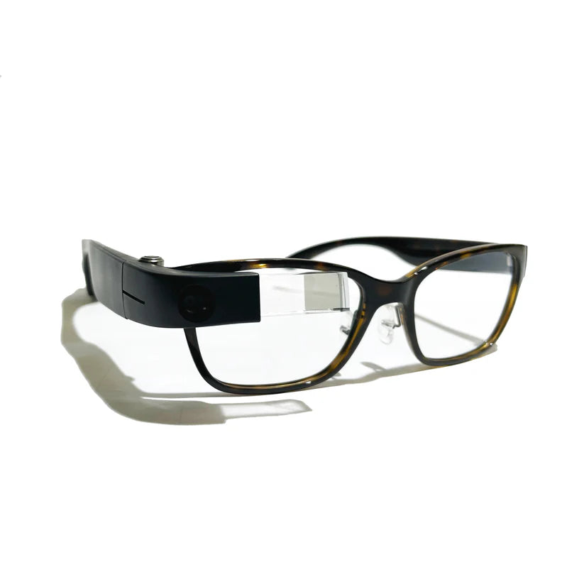 Side view of the sleek Lux Sajama Tortoise Frames on a crisp white background.