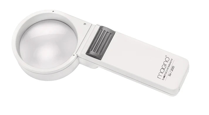 Magno Magnifying 5x glass with white case on a white background