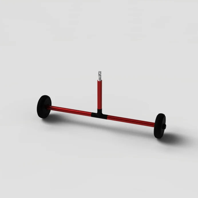 Red metal rod with black wheels on a light gray background