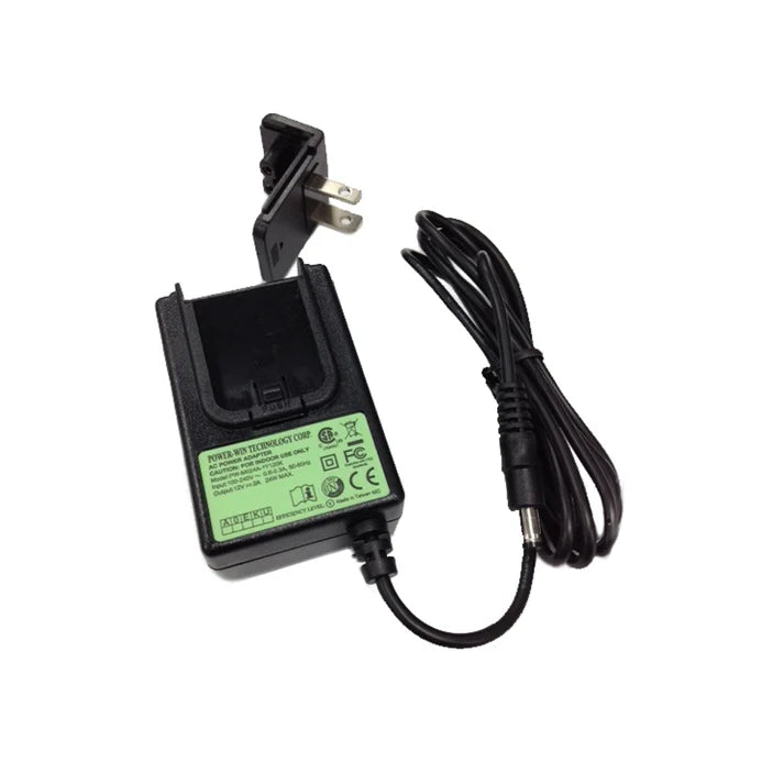 A black wall charger adapter with a US plug, a black power cord, and a green label on a white background.