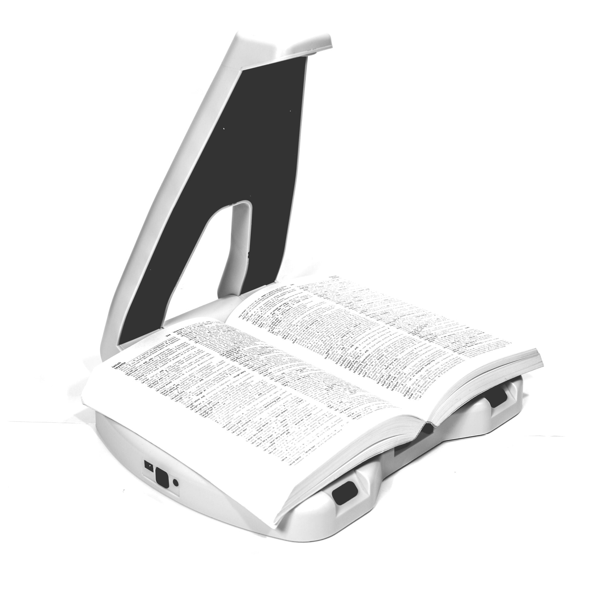 An OCR device with an open book on the scanner bed.
