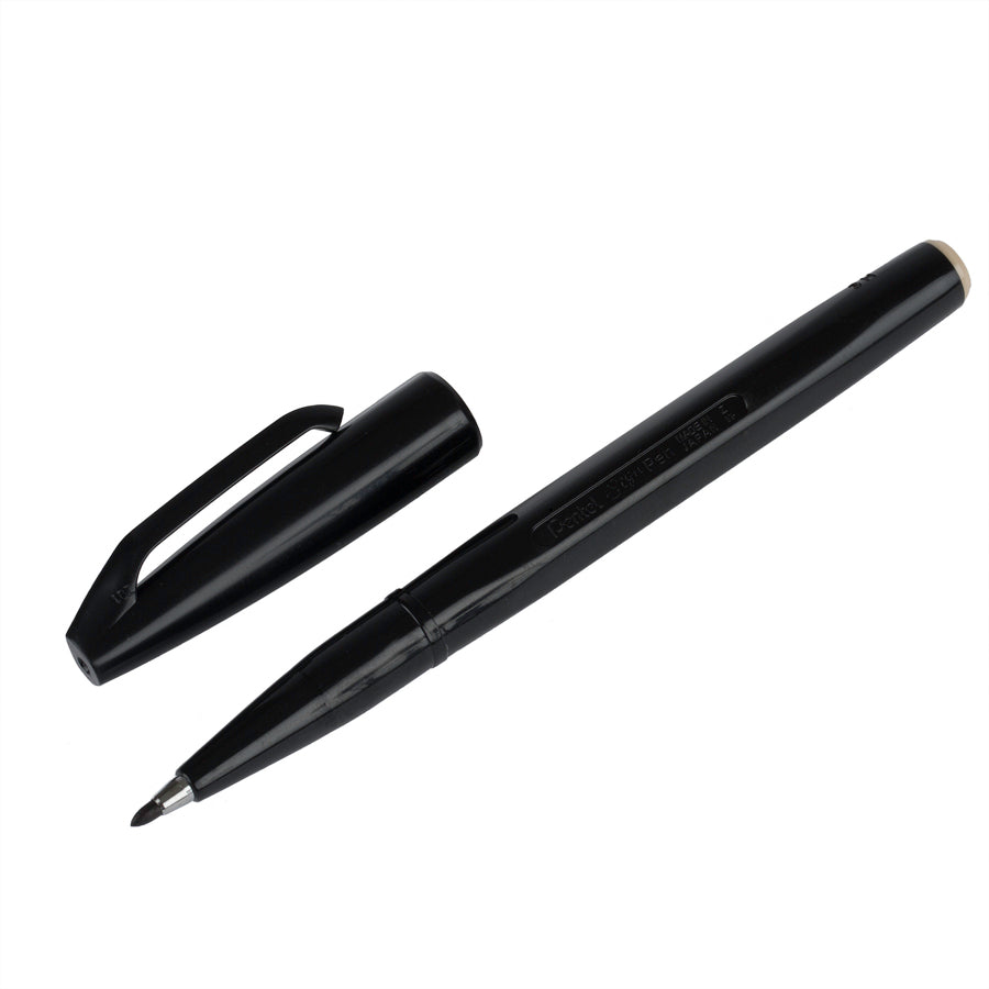 A black fibre tip pen with its cap removed, displaying the tip and the black body of the pen.